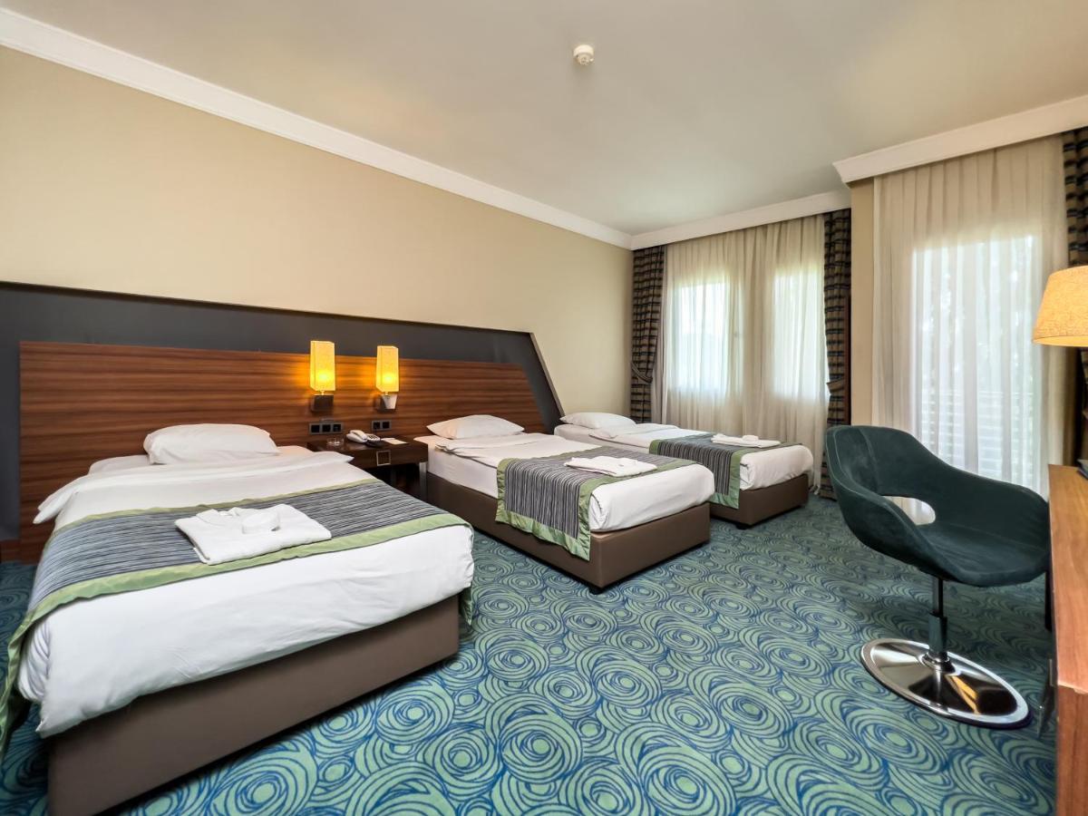 Spa Hotel Colossae Thermal Karahayit  Exterior foto A room at the hotel